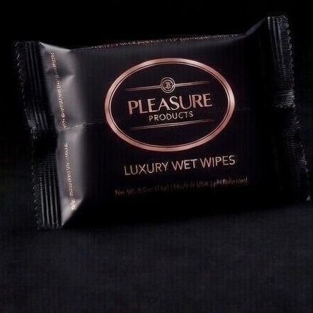 Pleasure Products luxury wet wipes packaging on a black background